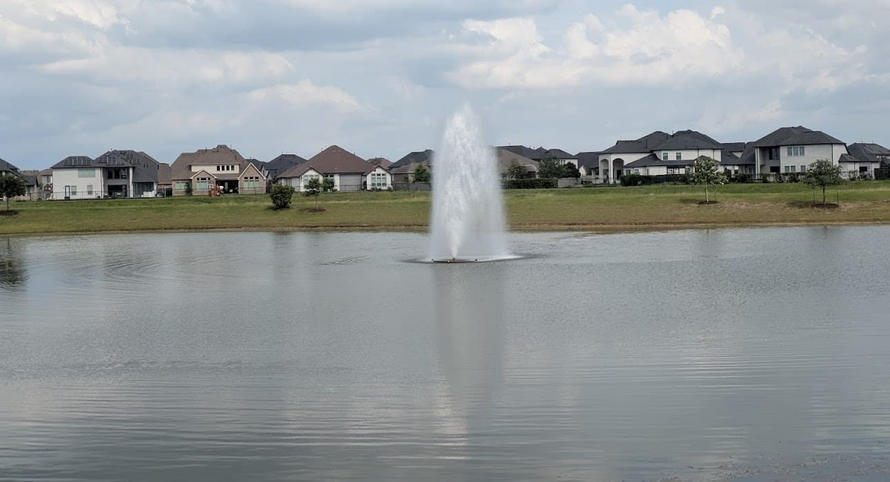 Master-planned community lakes are everywhere in Pearland — most have walking trails around them